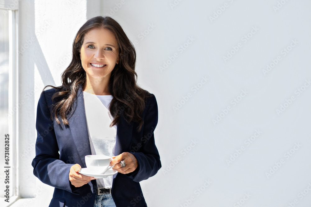 Attractive corporate businesswoman in formal have coffee break at office Attractive corporate businesswoman in formal have coffee break at office