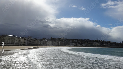 La concha beach in San Sebastian Spain,temporary storm in autumn photo