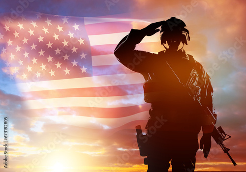 Military person from USA. Warrior army at sunset. Soldier stands with machine gun. USA flag in sky. American military person is ready for battle. Soldier salutes. Silhouette of fighter. 3d image photo