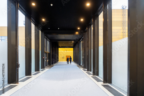 Long corridor with large wi...