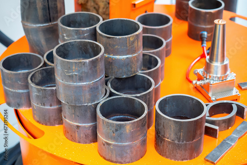 Steel rings on orange surfa...