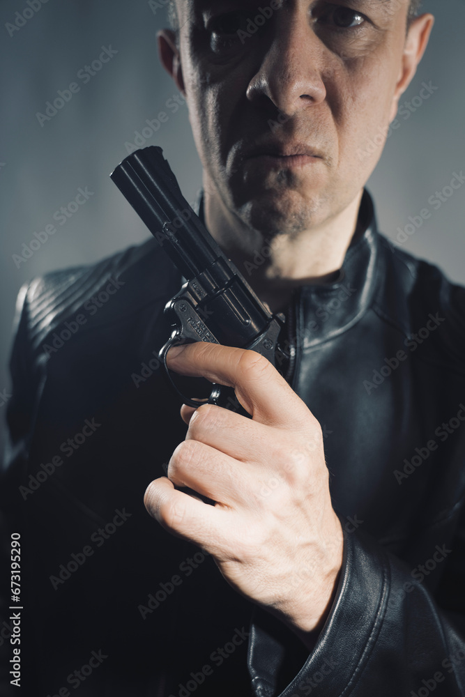Black leather jacket hitman spy with gun Black leather jacket hitman spy with gun