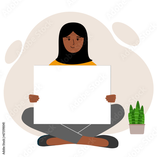 A woman sits cross-legged and holds a large white sheet with space for text. Advertising, poster, information, announcement.