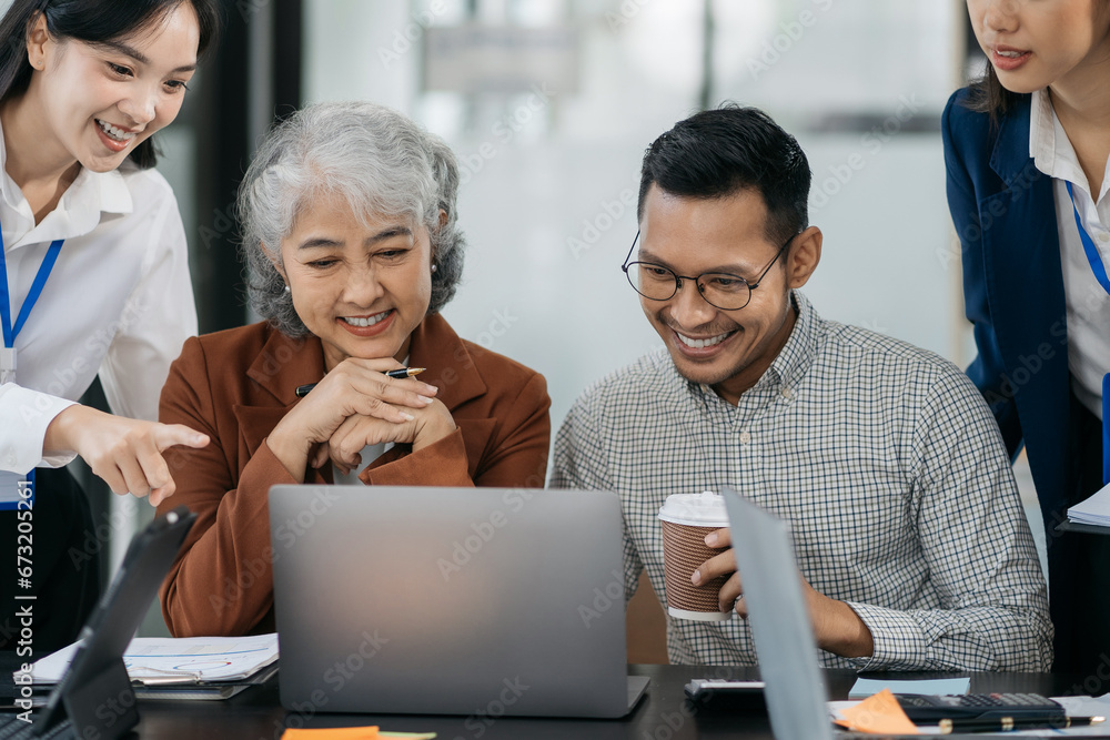 Happy smiling businessman feel happy work complete Teamwork success, success at work in the office concept. Happy smiling businessman feel happy work complete Teamwork success, success at work in the office concept.
