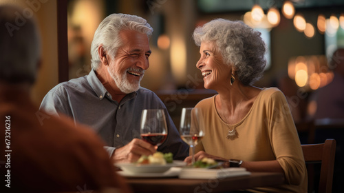 An elderly couple shares a heartfelt moment over dinner, laughing and connecting amidst the warm ambiance of a candlelit restaurant.