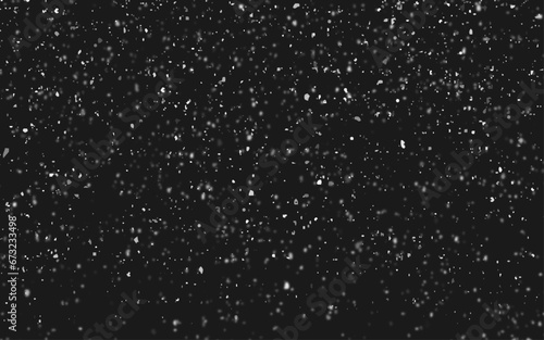 Flying rain or snow on black background