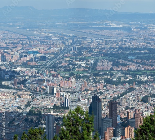 Aerial view of the bustling cityscape of Bogota. Colombia. © Wirestock