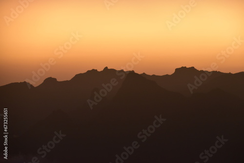 Orange sky at a stunning sunset above the clouds on Mount Kilimanjaro in Tanzania  Africa