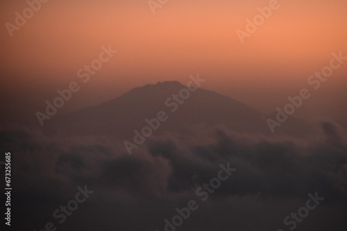 Orange sky at a stunning sunset above the clouds on Mount Kilimanjaro in Tanzania, Africa