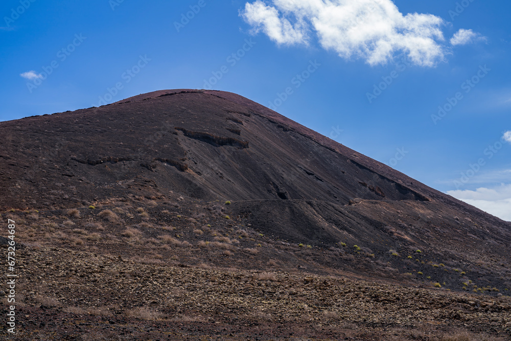 View of the impressive crater on the side of the slope of one of the most important volcanoes on the island. Photography taken in Fuerteventura, Canary Islands, Spain