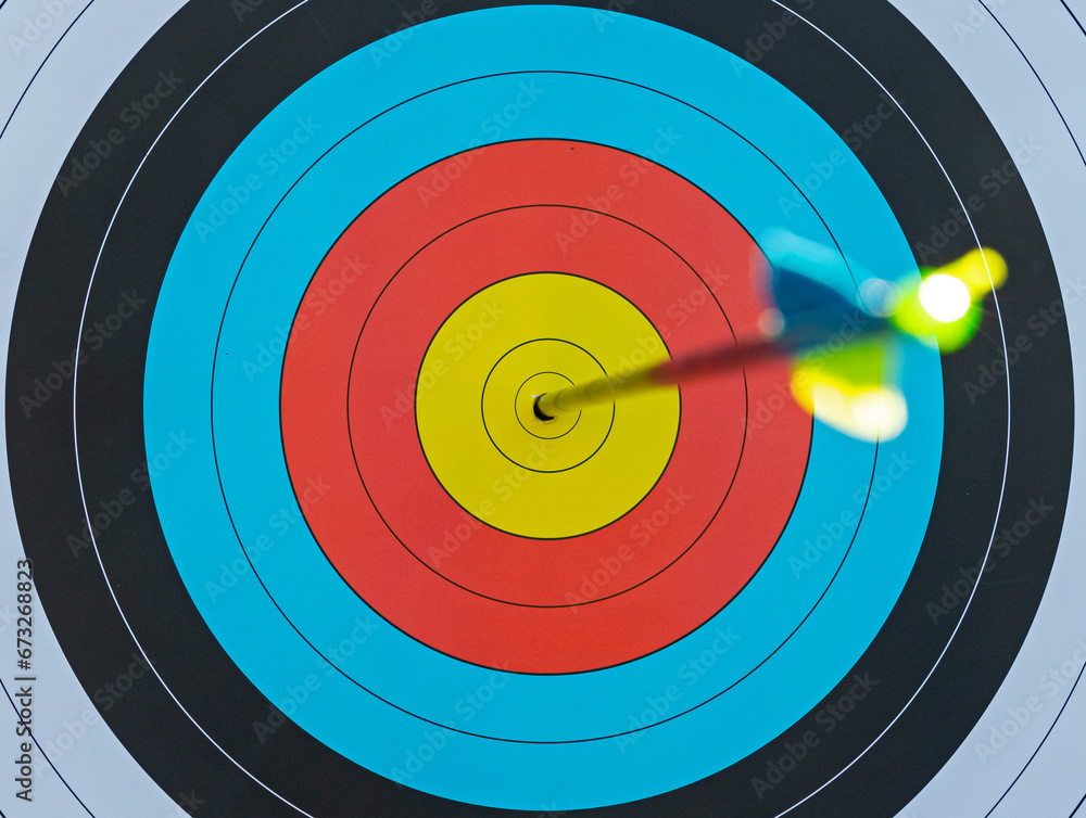 arrow shot in the center focus on target arrow shot in the center focus on target