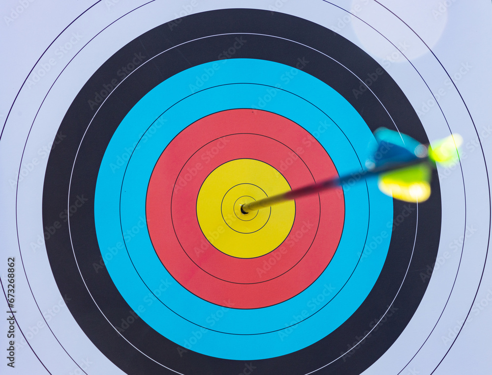 arrow shot in the center focus on target arrow shot in the center focus on target