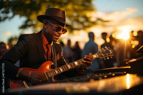 black jazz soloist playing guitar
 photo