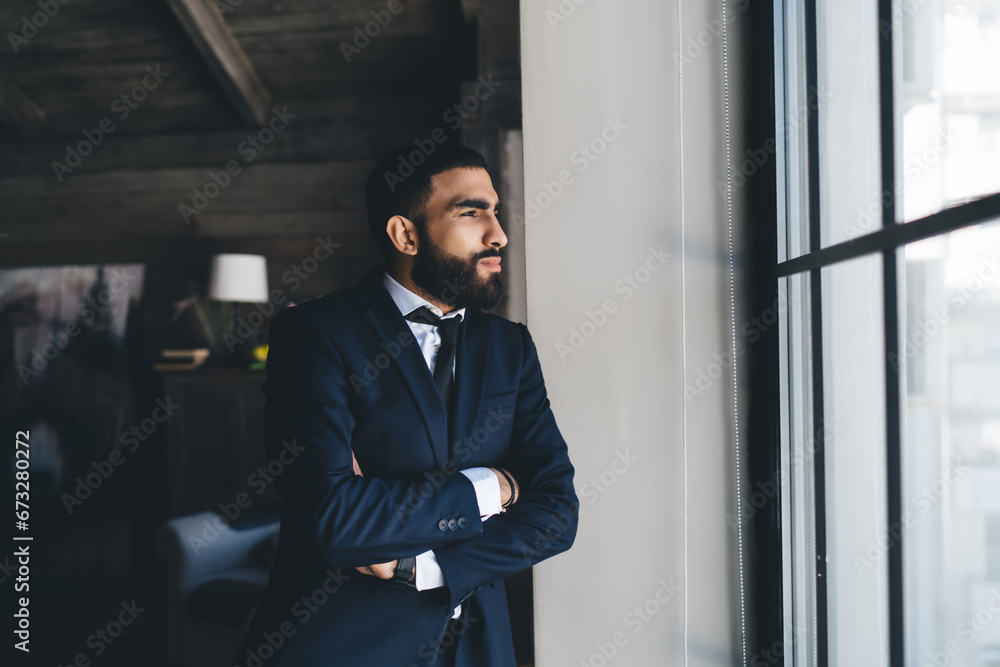 Confident ethnic businessman with arms crossed Confident ethnic businessman with arms crossed