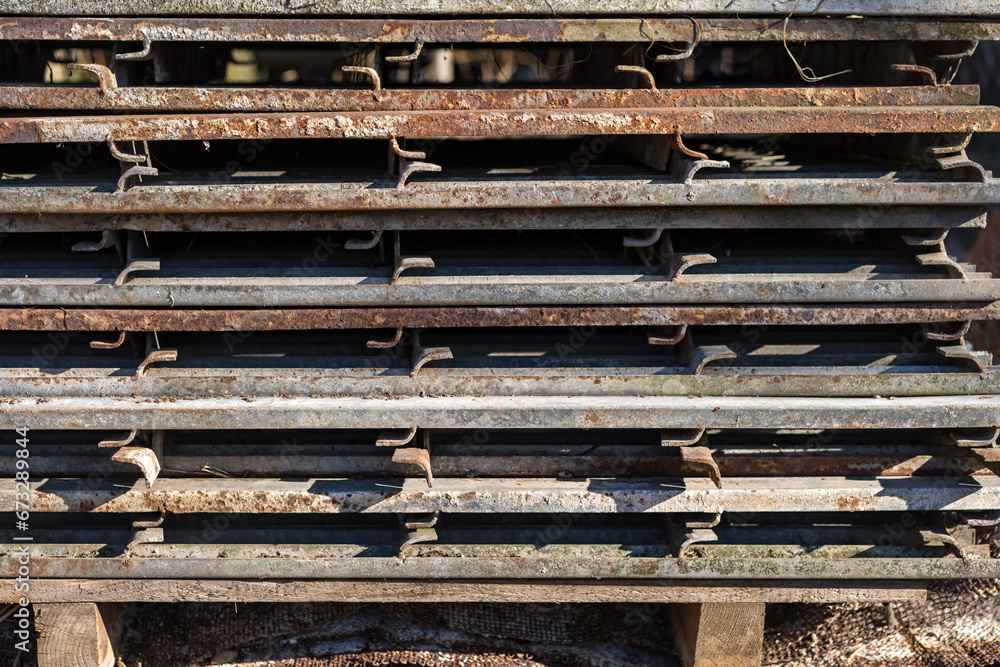 a Tower of Stacked Metal Bars That Form an Impressive Structure