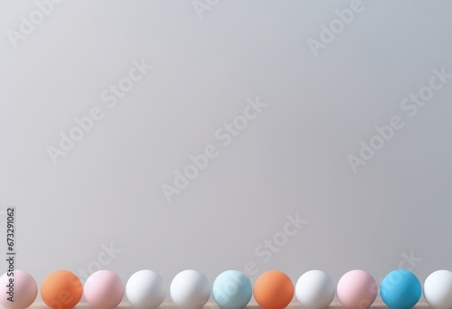colorful easter eggs in a row on a white background.colorful easter eggs in a row on a white background.colorful easter eggs and copy space on white background, top view, holiday easter background. ea