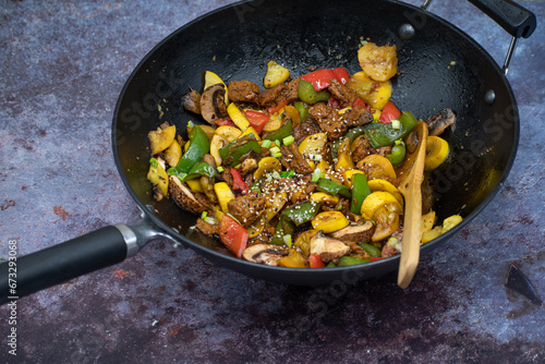 Vegan  meat and vegetables  stir fry in wok