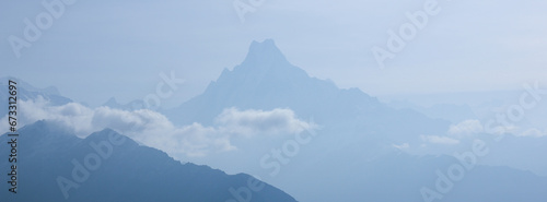 Outlines of famous fishtail mountain Machapuchare in early morning.