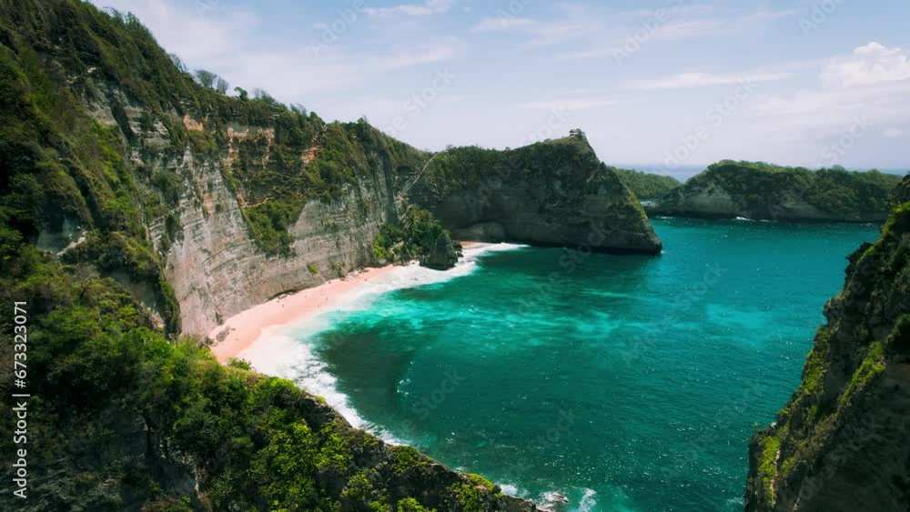 Diamond beach with crystal clear ocean waves in Bali. Pristine seascape with turquoise water. Exotic Island Nusa Penida, Indonesia. Diamond beach with crystal clear ocean waves in Bali. Pristine seascape with turquoise water. Exotic Island Nusa Penida, Indonesia.