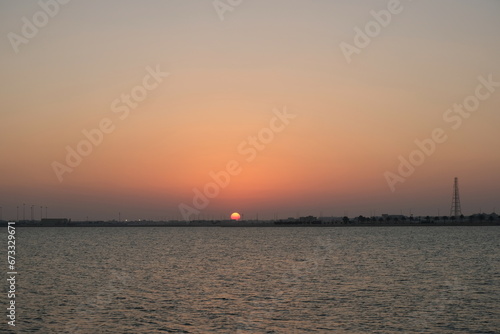 Moring sun kissing the horizon © backpackwithfuji