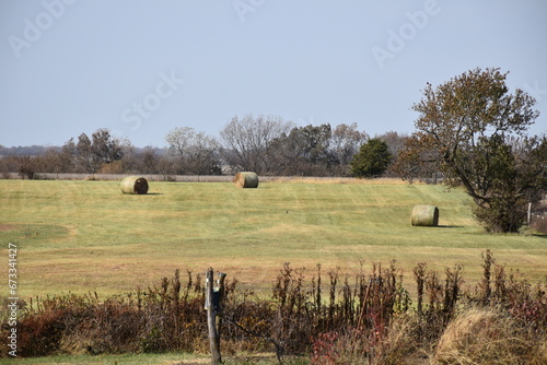 Hay Bales on a Hill in a Farm Field