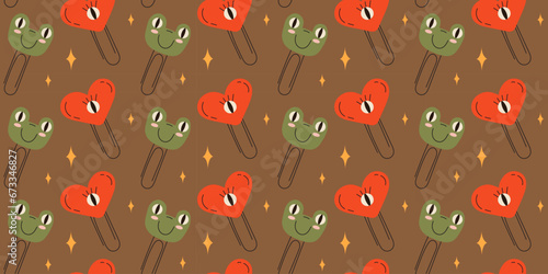 Seamless pattern with childrens paper clips on a brown background. paper clip frog. Pattern for wrapping paper print on fabric. Vector stock illustration in hand drawn style.