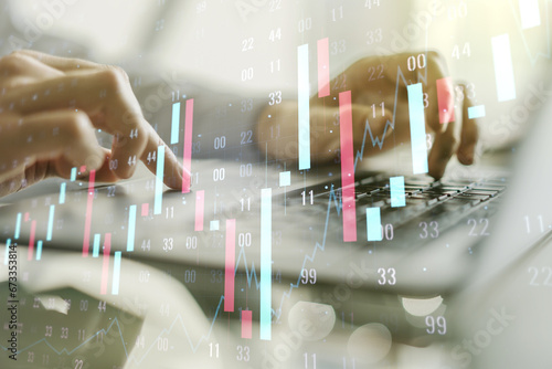 Double exposure of abstract creative financial diagram with hand typing on computer keyboard on background, banking and accounting concept photo