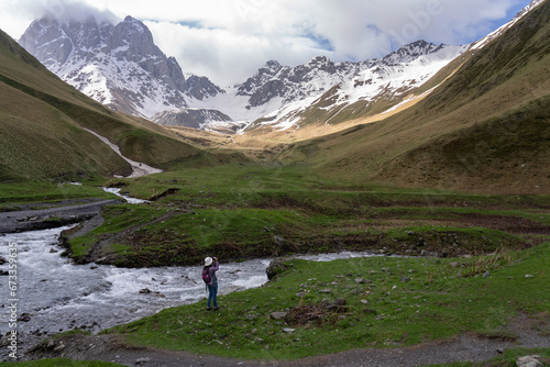 Asian Woman Trekking on Beautiful Trail in Juta Georgia in Summer