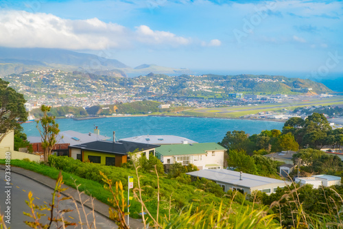Wellington city in NZ near the airport, with the blue ocean and strong winds photo