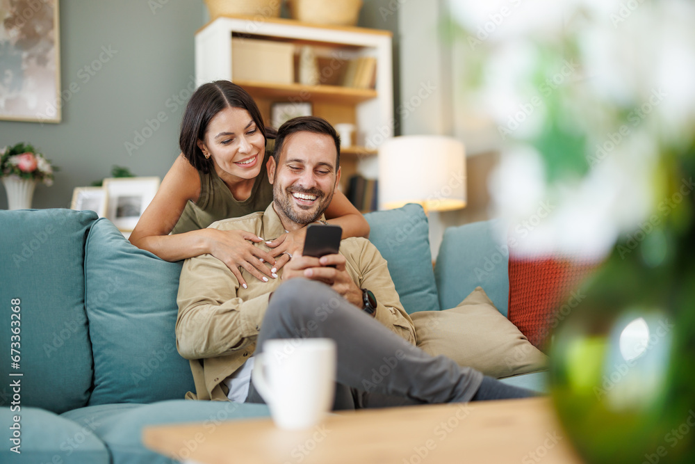 Young couple at home drinking coffee Young couple at home drinking coffee