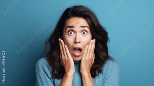 Woman with wow face holding hands near cheeks. Sale or discount advertising poster with surprised female. Blue background