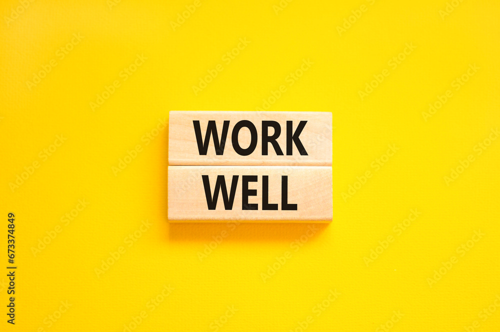 Work well symbol. Concept words Work well on beautiful wooden block. Beautiful yellow table yellow background. Business marketing, motivational work well concept. Copy space. Work well symbol. Concept words Work well on beautiful wooden block. Beautiful yellow table yellow background. Business marketing, motivational work well concept. Copy space.