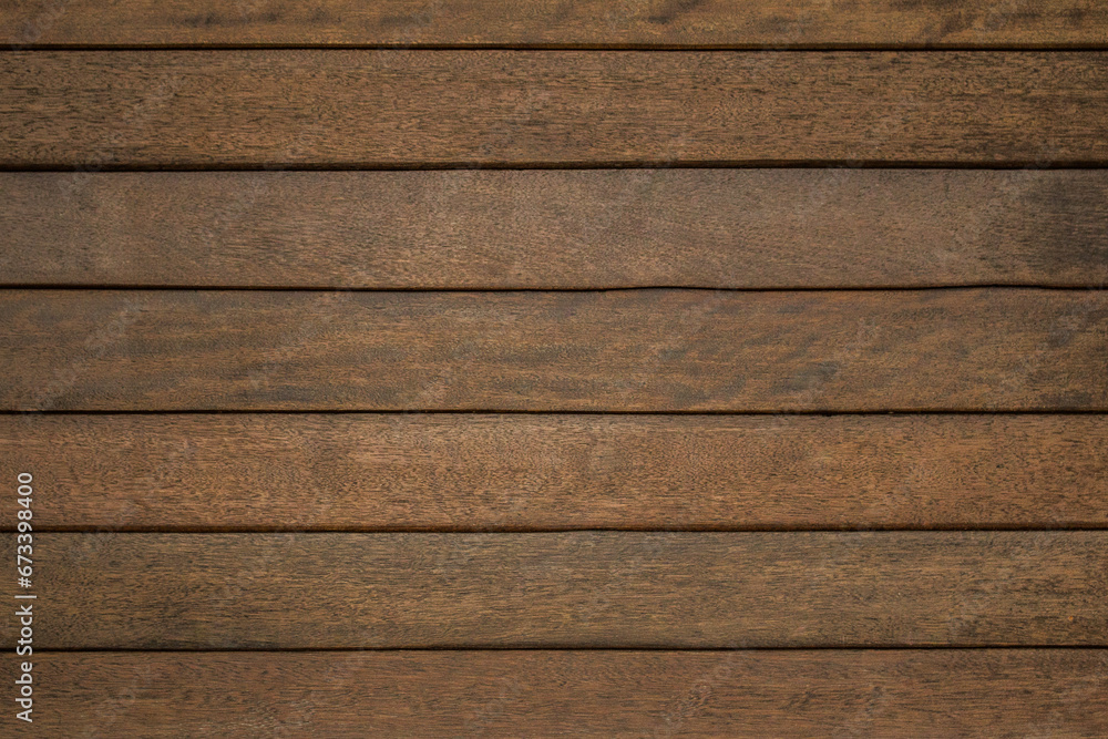 Obraz premium Dark brown wooden plank wall texture for use in backgrounds, construction materials, or design projects