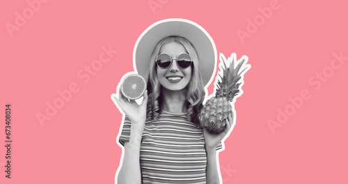 Summer portrait of happy smiling young woman with pineapple and slice of orange, fresh tropical juicy fruits, wearing straw hat, sunglasses on pink background, magazine style