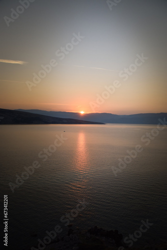 sunrise over the sea, clear sky without clouds. golden hour. © doda