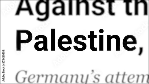 Mention of Palestine in the headlines of electronic information media. Highlighted fast changing iridescent letters close up. Breaking news about the military conflict between Israel and Gaza