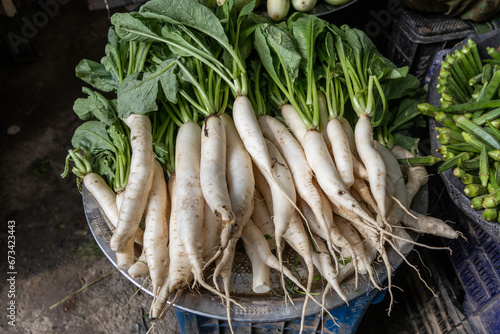 Fresh fruits and vegetables at Daryagang market in Delhi in India. radishes
