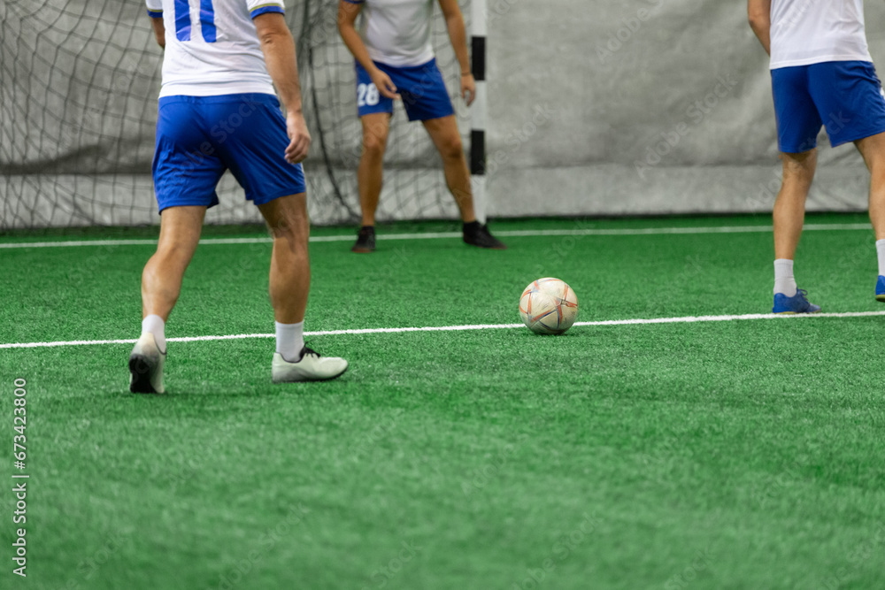 Futsal players rivals in action. Sport mini soccer futbol sala concept.
