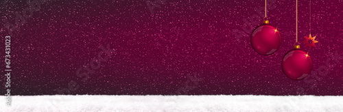 Christmas balls on red background and white snow .