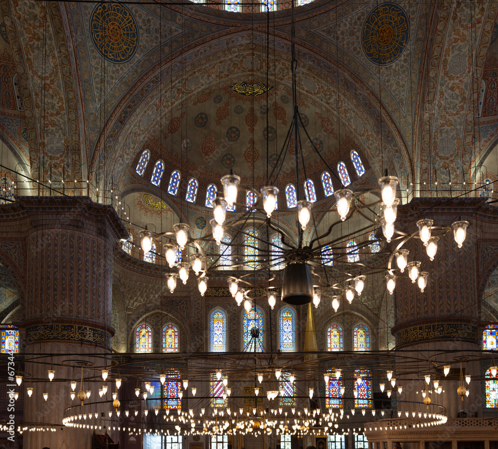 Interior of the Sultan Ahmed Mosque (Blue Mosque). Details from inside the historical Sultanahmet Mosque in Istanbul. Turkish Islamic art, history and tourist attractions of Istanbul. Ramadan.