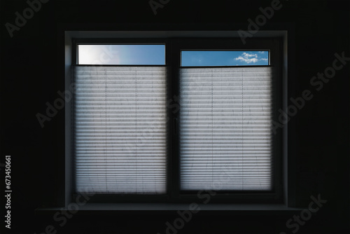 Window in a private house with blinds