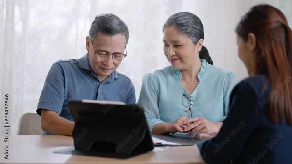 Financial advisor,realtor agent,insurance,lawyer,Manage your retirement fund concept.Financial advisor showing presentation on computer,deal shake hand to happiness Elderly asian couple retirement Financial advisor,realtor agent,insurance,lawyer,Manage your retirement fund concept.Financial advisor showing presentation on computer,deal shake hand to happiness Elderly asian couple retirement