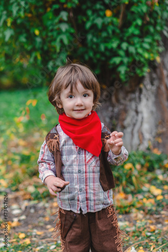 Little cowboy in the autumn field