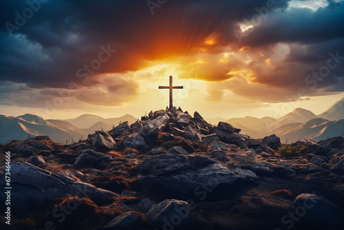 silhouette christian cross on a hill or mountain against sundown