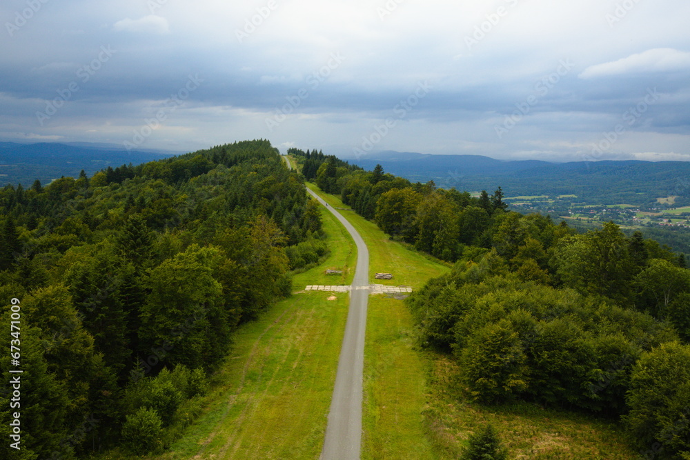Narrow asphalt road in the middle of a mountain in the Bieszczady Mountains Narrow asphalt road in the middle of a mountain in the Bieszczady Mountains