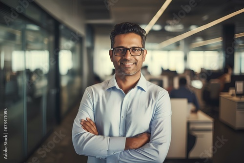 An Indian male entrepreneur in office, his wisdom and character etched in every line, set against the urban modern interior backdrop. generative AI