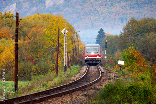 Passenger train on Vadu Crsiului railway, Occidental Carpathians, Romania, Europe	 photo