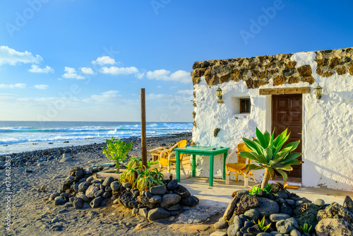 Fototapeta Naklejka Na Ścianę i Meble -  Beautiful small house over sea shore