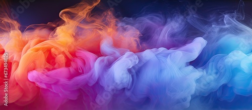 A detailed picture showing multiple colors and varying intensity of light creates a visual effect resembling clouds and fog photo