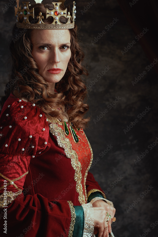 medieval queen in red dress with crown medieval queen in red dress with crown